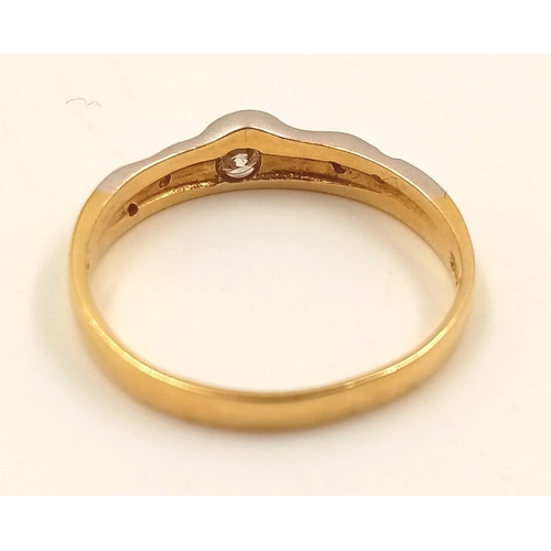 834 - An 18K Yellow and White Gold Diamond Ring. Size L1/2.
2.23g