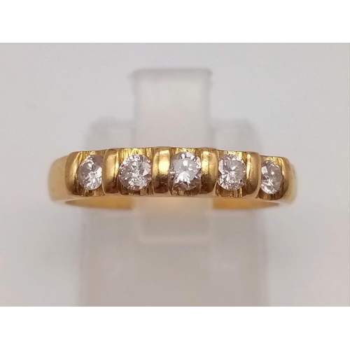 443 - An 18k Yellow Gold Diamond Half-Eternity Ring. 0.35ct.
Size M. 3.64g