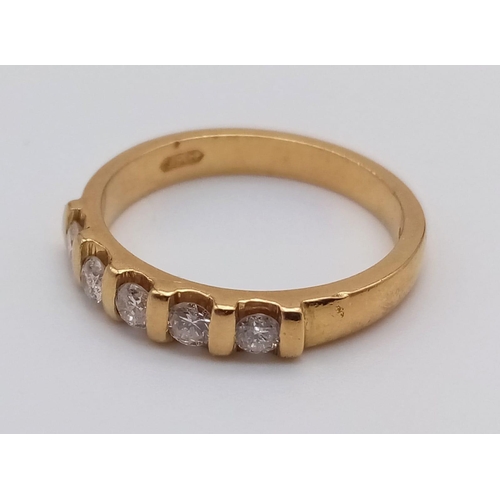 443 - An 18k Yellow Gold Diamond Half-Eternity Ring. 0.35ct.
Size M. 3.64g