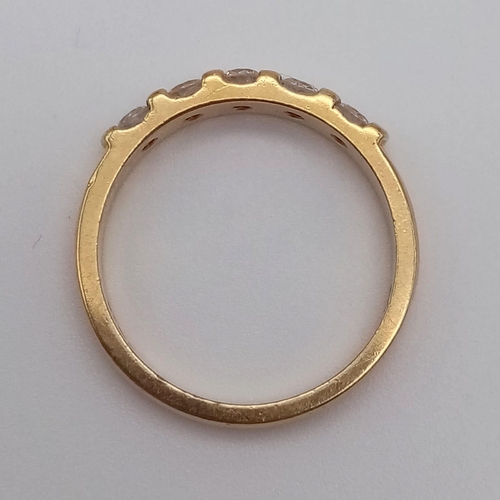 443 - An 18k Yellow Gold Diamond Half-Eternity Ring. 0.35ct.
Size M. 3.64g