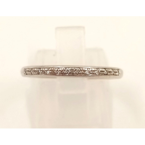 736 - An 18k White Gold Diamond Half-Eternity Ring. Size N.
3.24g