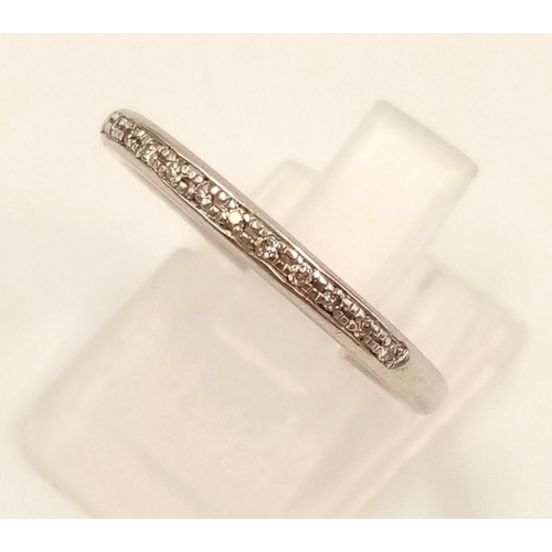 736 - An 18k White Gold Diamond Half-Eternity Ring. Size N.
3.24g