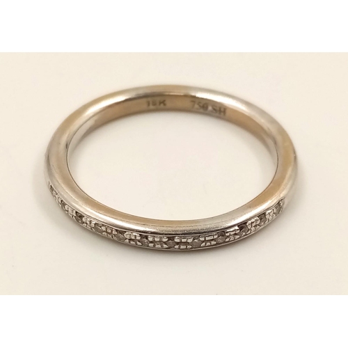 736 - An 18k White Gold Diamond Half-Eternity Ring. Size N.
3.24g