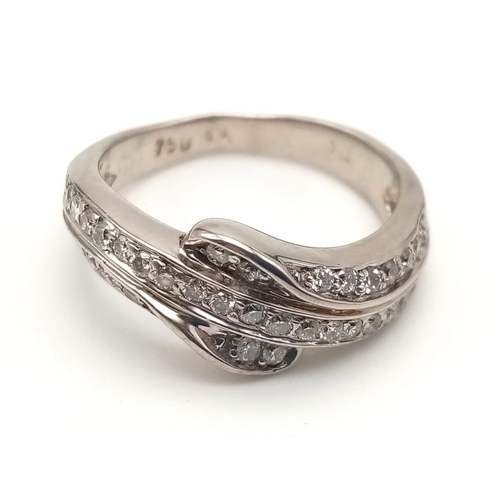 743 - An 18K White Gold Three-Row Diamond Half-Eternity Ring. Size N. 4.97g