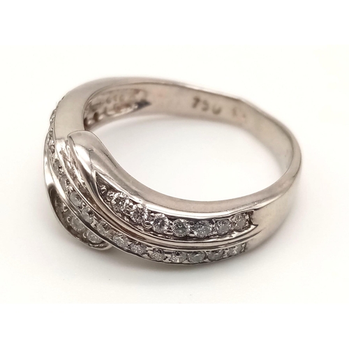 743 - An 18K White Gold Three-Row Diamond Half-Eternity Ring. Size N. 4.97g