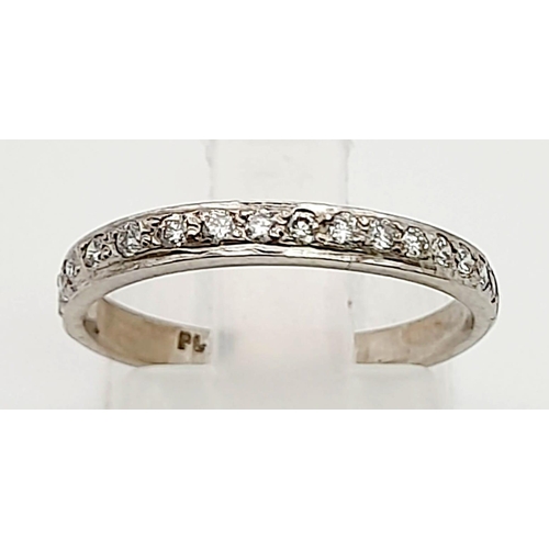 989 - A Platinum Diamond Half-Eternity Ring. 0.50ct. Size K.
2.57g total weight.