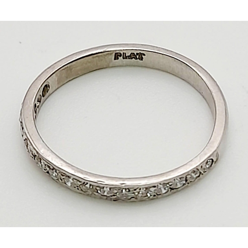 989 - A Platinum Diamond Half-Eternity Ring. 0.50ct. Size K.
2.57g total weight.