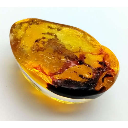 1363 - A Nightmarish Looking Scorpion in Amber Coloured Resin. Pendant or small paperweight.