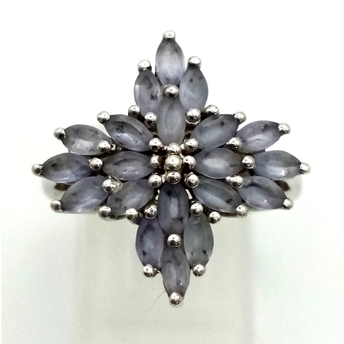 1387 - A 925 Silver Lavender Coloured Stone Floral Ring. Size N/O.