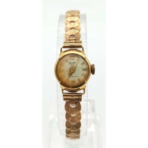 199 - An Avia 18k Gold Watch. 18k gold strap and case. Not working so a/f. 12.33g total weight.