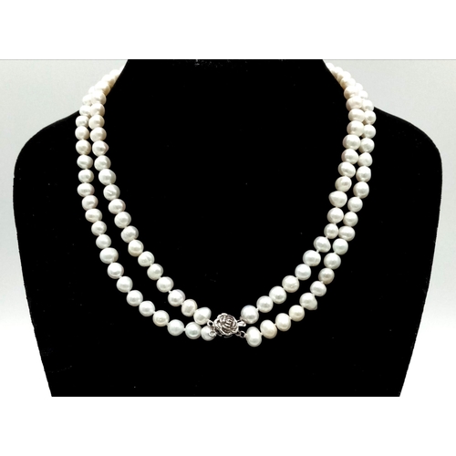 336 - A Two Row Natural Akoya Saltwater Pearl Necklace. 7/8mm pearls. 42cm