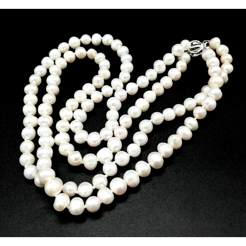 336 - A Two Row Natural Akoya Saltwater Pearl Necklace. 7/8mm pearls. 42cm