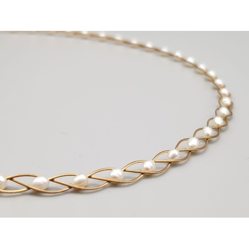 393 - A Beaverbrooks 9K Yellow Gold Lattice Pearl Choker Necklace. 38cm. Comes in a presentation case. 5.2... 