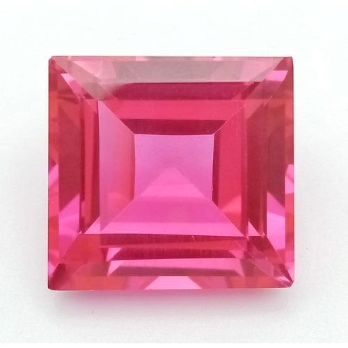 394 - A 46ct Pink/Red-Ruby Coloured Gemstone. Pyramid step cut.  20 x 20mm. No certificate so as found.