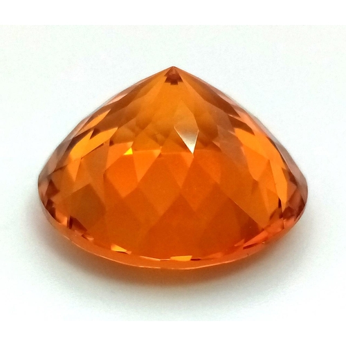 439 - A 26ct Amber/Orange Coloured Cabochon Gemstone. Wonderfully faceted. 17mm base diameter. No certific... 