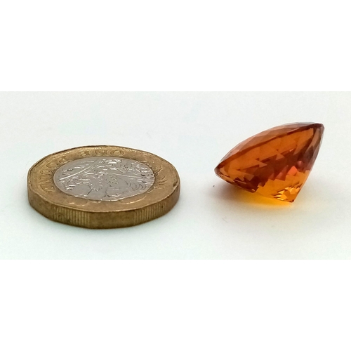 439 - A 26ct Amber/Orange Coloured Cabochon Gemstone. Wonderfully faceted. 17mm base diameter. No certific... 