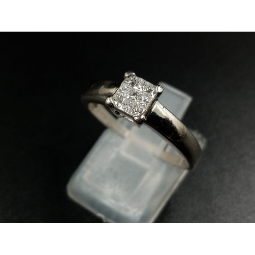 652 - A Platinum Nine Diamond Ring - Nine diamonds for the perfect square. 0.30ct.  Size Q. 4.69g