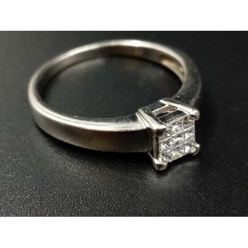 652 - A Platinum Nine Diamond Ring - Nine diamonds for the perfect square. 0.30ct.  Size Q. 4.69g