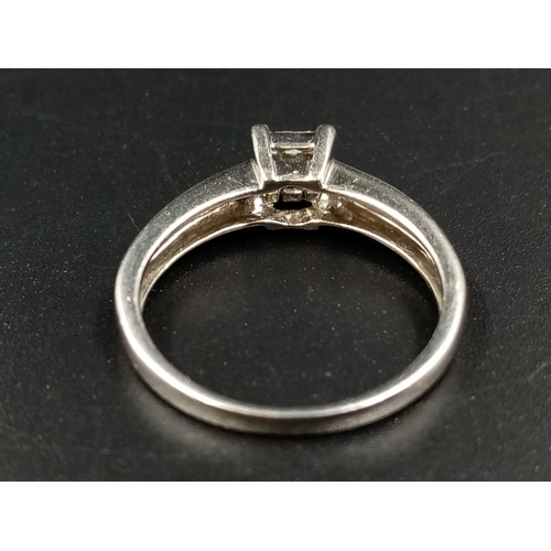 652 - A Platinum Nine Diamond Ring - Nine diamonds for the perfect square. 0.30ct.  Size Q. 4.69g