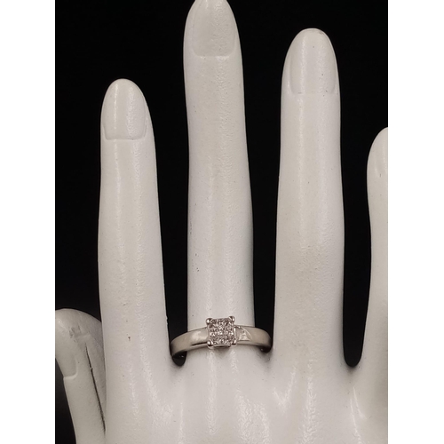 652 - A Platinum Nine Diamond Ring - Nine diamonds for the perfect square. 0.30ct.  Size Q. 4.69g