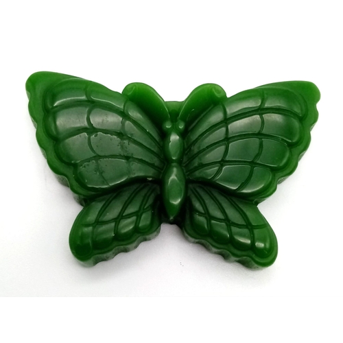 889 - A Green Jade Butterfly Pendant. 5cm wingspan.