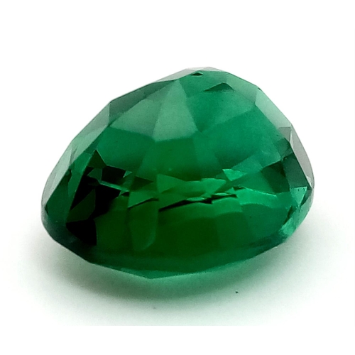 925 - An 18ct Emerald Green Coloured Step Cut Gemstone. 18 x 15mm. No certificate so as found.