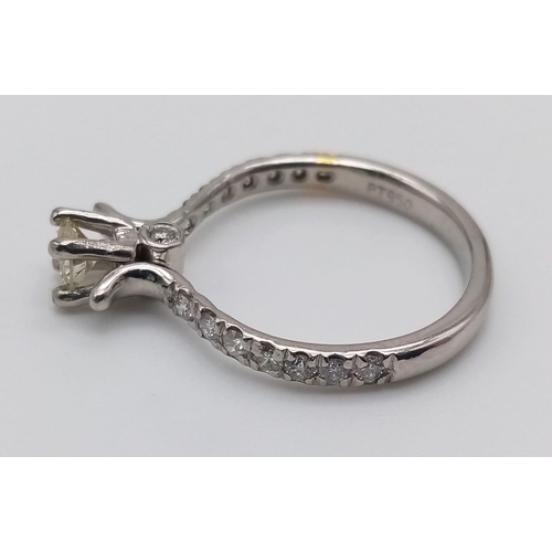 403 - A Platinum and Diamond Ring. Central diamond with diamonds on shoulders. 0.35 and 0.25ct. Size L.
4.... 