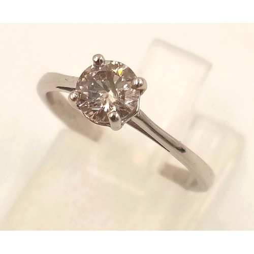 869 - A Platinum Solitaire Diamond Ring. 0.5ct. L- I1. Size J.
2.42g