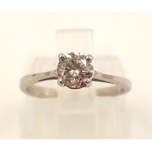 869 - A Platinum Solitaire Diamond Ring. 0.5ct. L- I1. Size J.
2.42g