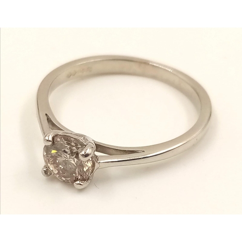 869 - A Platinum Solitaire Diamond Ring. 0.5ct. L- I1. Size J.
2.42g