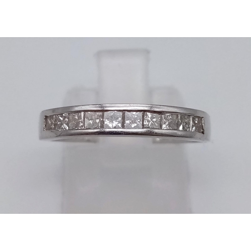 764 - A Platinum Diamond Half-Eternity Ring. 0.30ct.
Size O. 3.1g