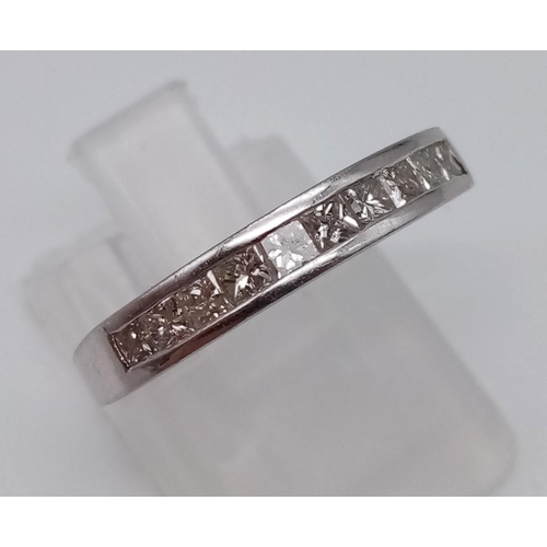 764 - A Platinum Diamond Half-Eternity Ring. 0.30ct.
Size O. 3.1g