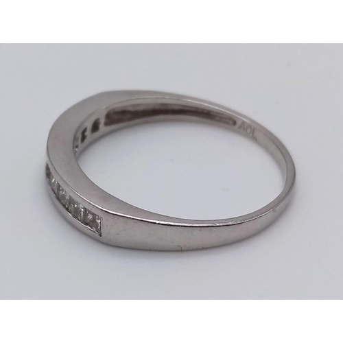 764 - A Platinum Diamond Half-Eternity Ring. 0.30ct.
Size O. 3.1g