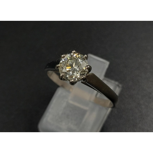 417 - A Platinum Diamond Solitaire Ring. 1.20ct - I-VS Grade.
Size R. 4.81g.