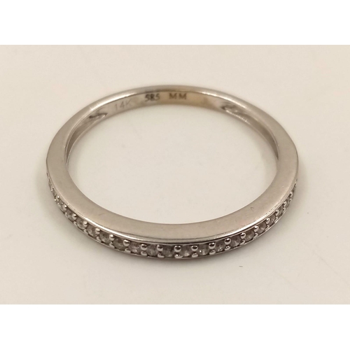 848 - A 14K White Gold Diamond Half-Eternity Ring. Size O.
1.45g