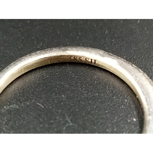 1143 - A 14k White Gold Diamond Half Eternity Ring. Size N. 1.9g