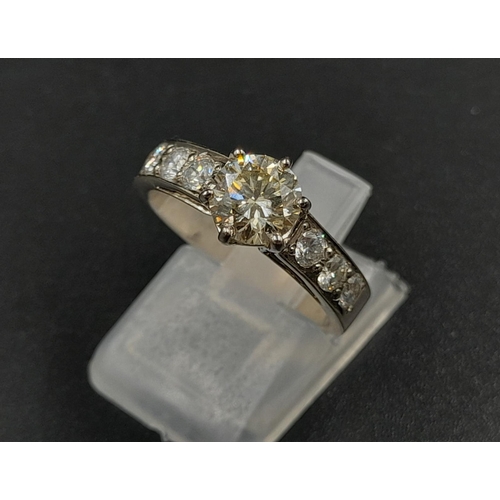 431 - A 14K White Gold Diamond Ring - Central Diamond with three diamonds on each shoulder. 1ct and 0.50ct... 