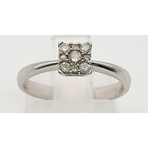 1148 - A 9K White Gold Diamond Ring with 9 Diamonds set in a Square shape. Size L. Total weight: 2.16g