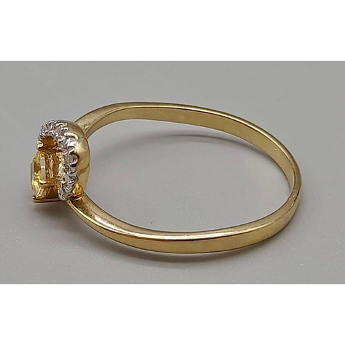 1045 - A 9K Yellow Gold Ring with Centre Yellow Stone and surrounded by wave of Diamond. Size U/T
Total wei... 