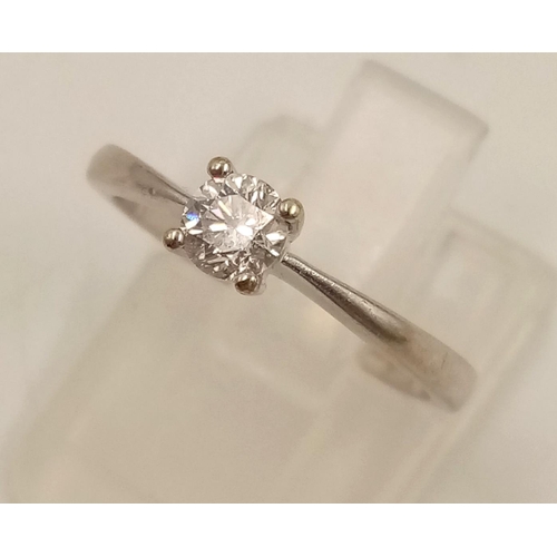 645 - A 9k White Gold Diamond Solitaire Ring. 0.20ct.
Size J. 1.90g