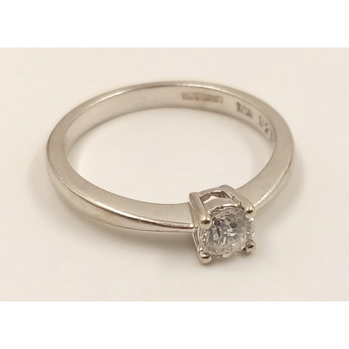 645 - A 9k White Gold Diamond Solitaire Ring. 0.20ct.
Size J. 1.90g