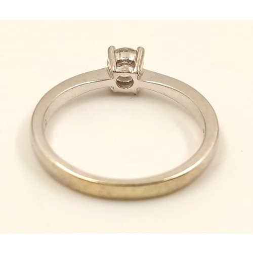 645 - A 9k White Gold Diamond Solitaire Ring. 0.20ct.
Size J. 1.90g