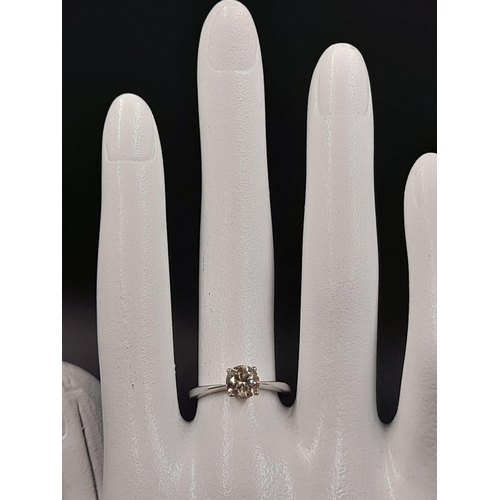 603 - A 9K White Gold Diamond Solitaire Ring. 0.77ct. I2 Grade.
Size K. 1.83g.