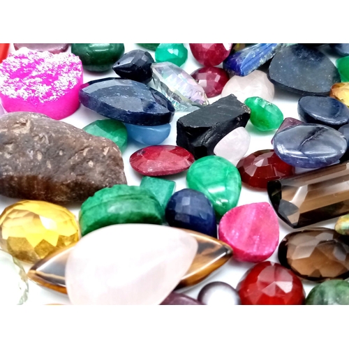 1389 - A 1553.65ct  Tiger Eye, Rose Quartz, Ruby, Jasper etc - Multi Gemstones Lot.