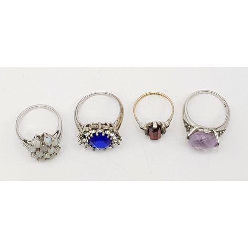 959 - Four Assorted 925 Silver Different Coloured Stone Set Rings. The Red stone ring is an antique 9K gol... 