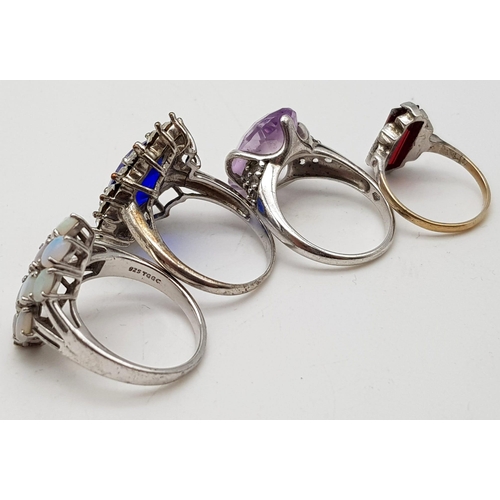 959 - Four Assorted 925 Silver Different Coloured Stone Set Rings. The Red stone ring is an antique 9K gol... 