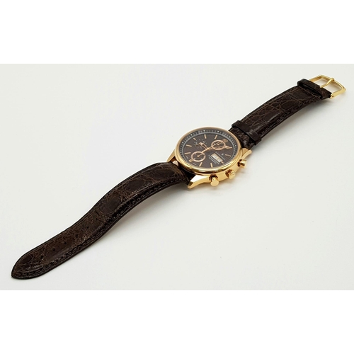 150 - A Christian Jacques Automatic 18K Gold Gents Chronograph Watch. Crocodile leather strap. 18k gold ca... 