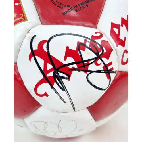 396 - An Arsenal FC 1999-2000 Signed Football. Signatures include Bergkamp, Adams, Keown, Dixon and Silvin... 