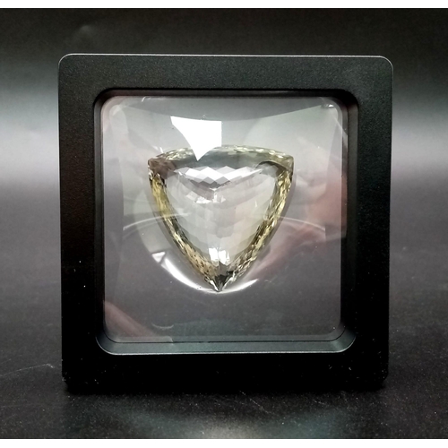 444 - A 77.06ct Trillion Shape AAA Certified Natural Citrine.  AIG Milan Certified in a presentation case.