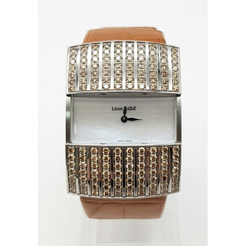 643 - A Leon Hatot Peek a Boo Diamond Ladies Watch. Brown leather strap. Diamond filled front case with pe... 